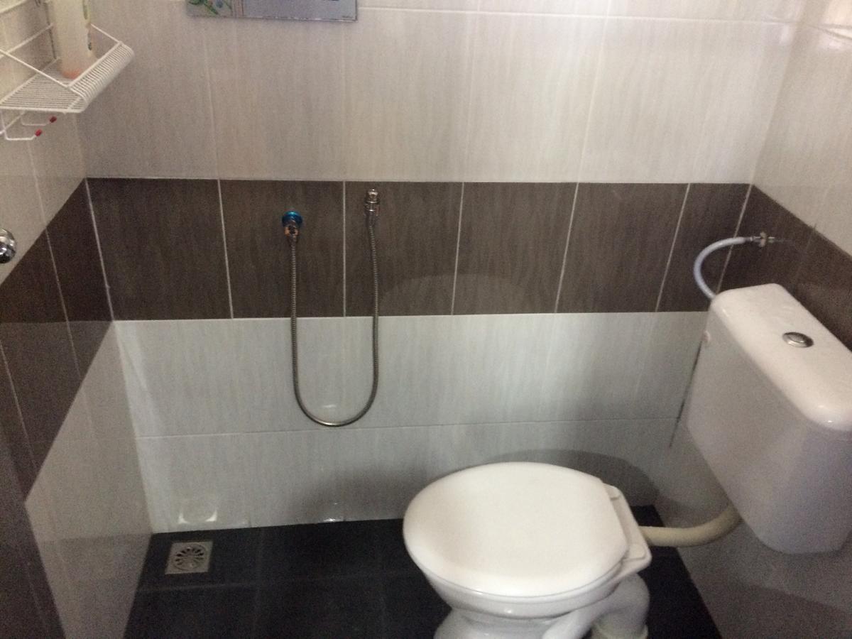 Roomstay Zulmi Arau Buitenkant foto