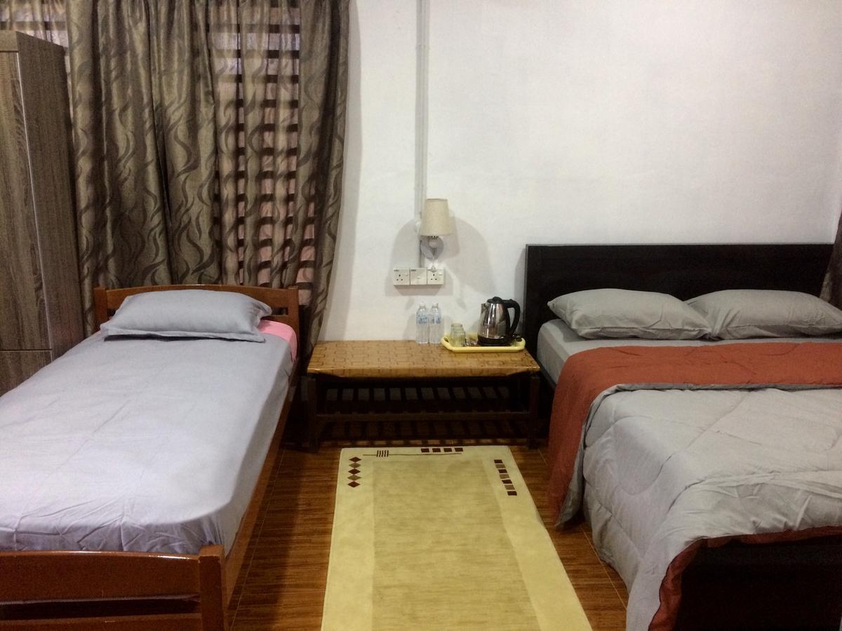Roomstay Zulmi Arau Buitenkant foto