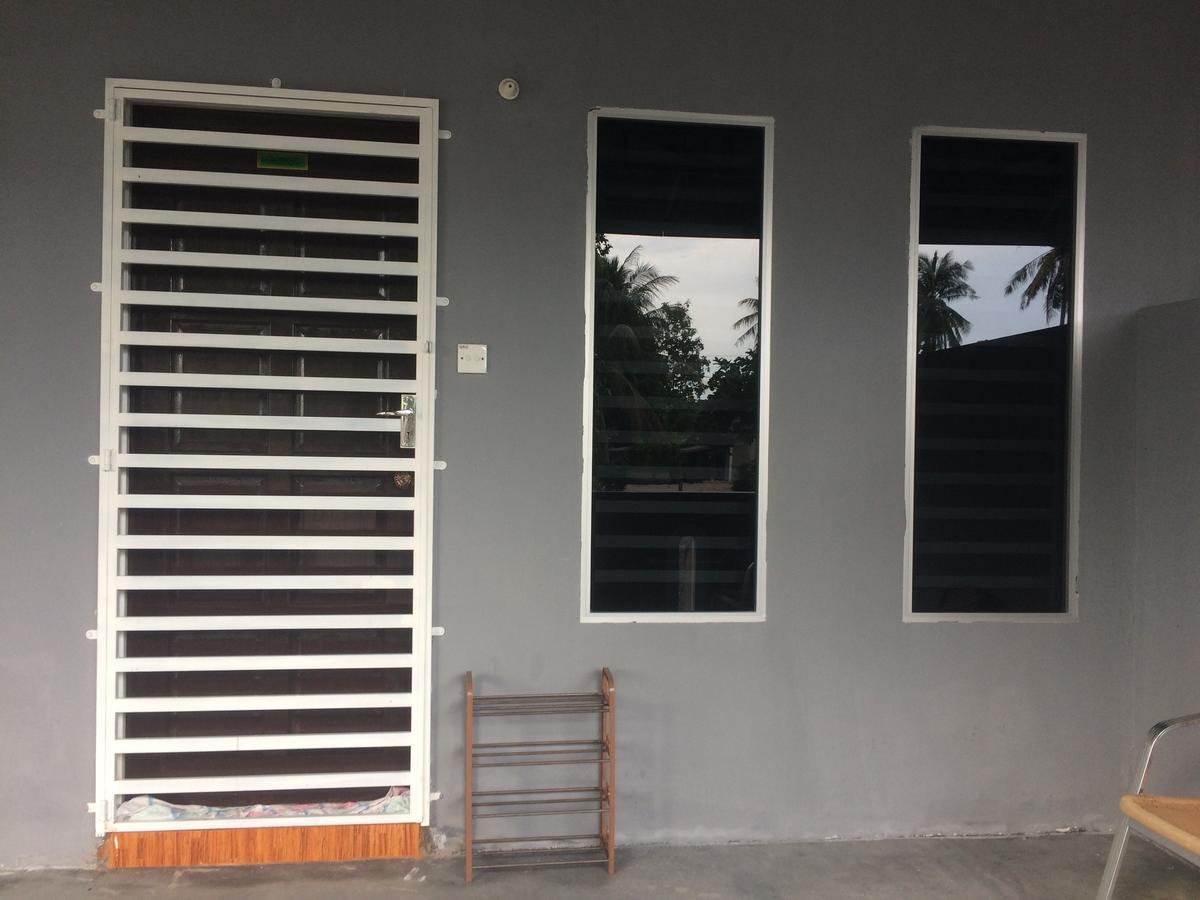 Roomstay Zulmi Arau Buitenkant foto