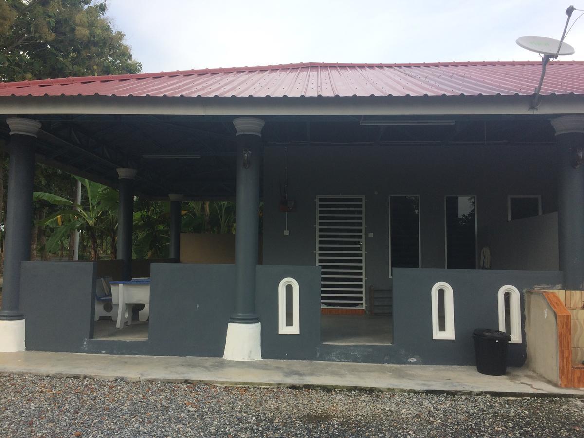 Roomstay Zulmi Arau Buitenkant foto