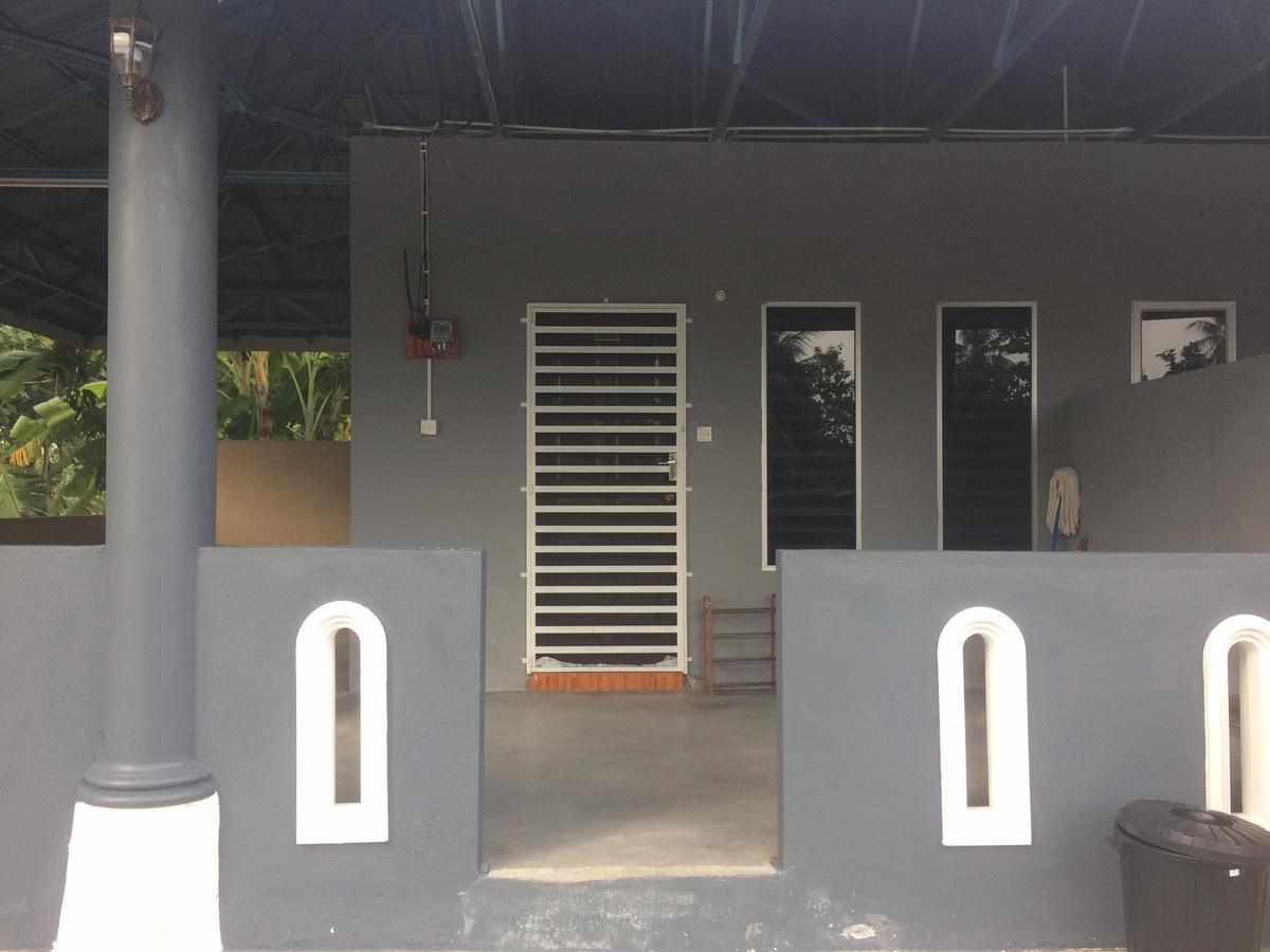 Roomstay Zulmi Arau Buitenkant foto