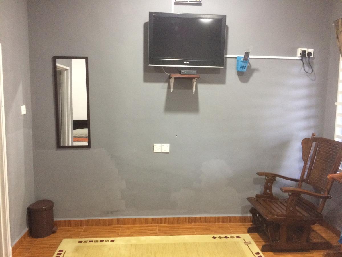 Roomstay Zulmi Arau Buitenkant foto